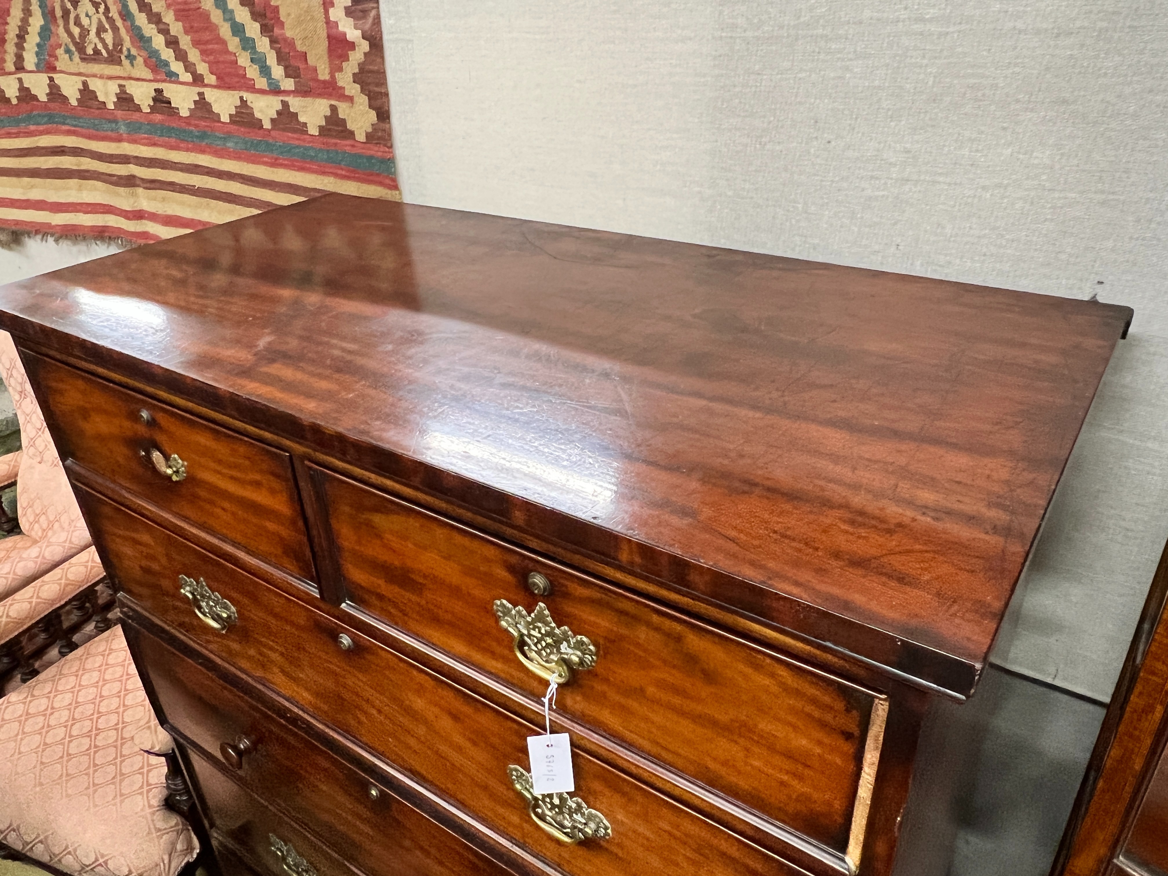 An early Victorian mahogany secretaire chest, fitted two short and four long drawers including a later converted drop front drawer, width 120cm, height 144cm